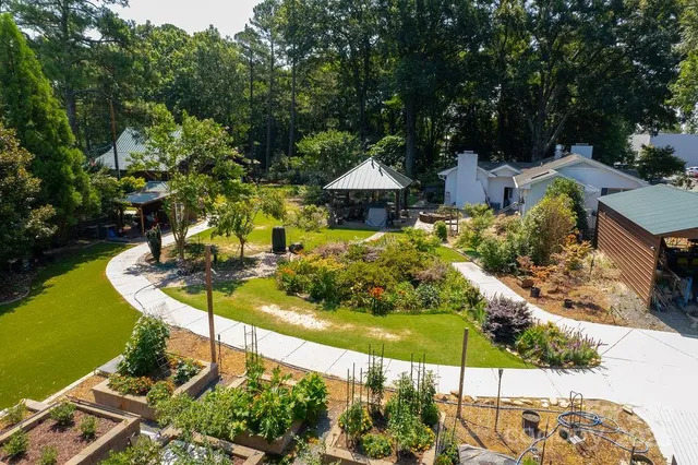 a view of a swimming pool with a patio