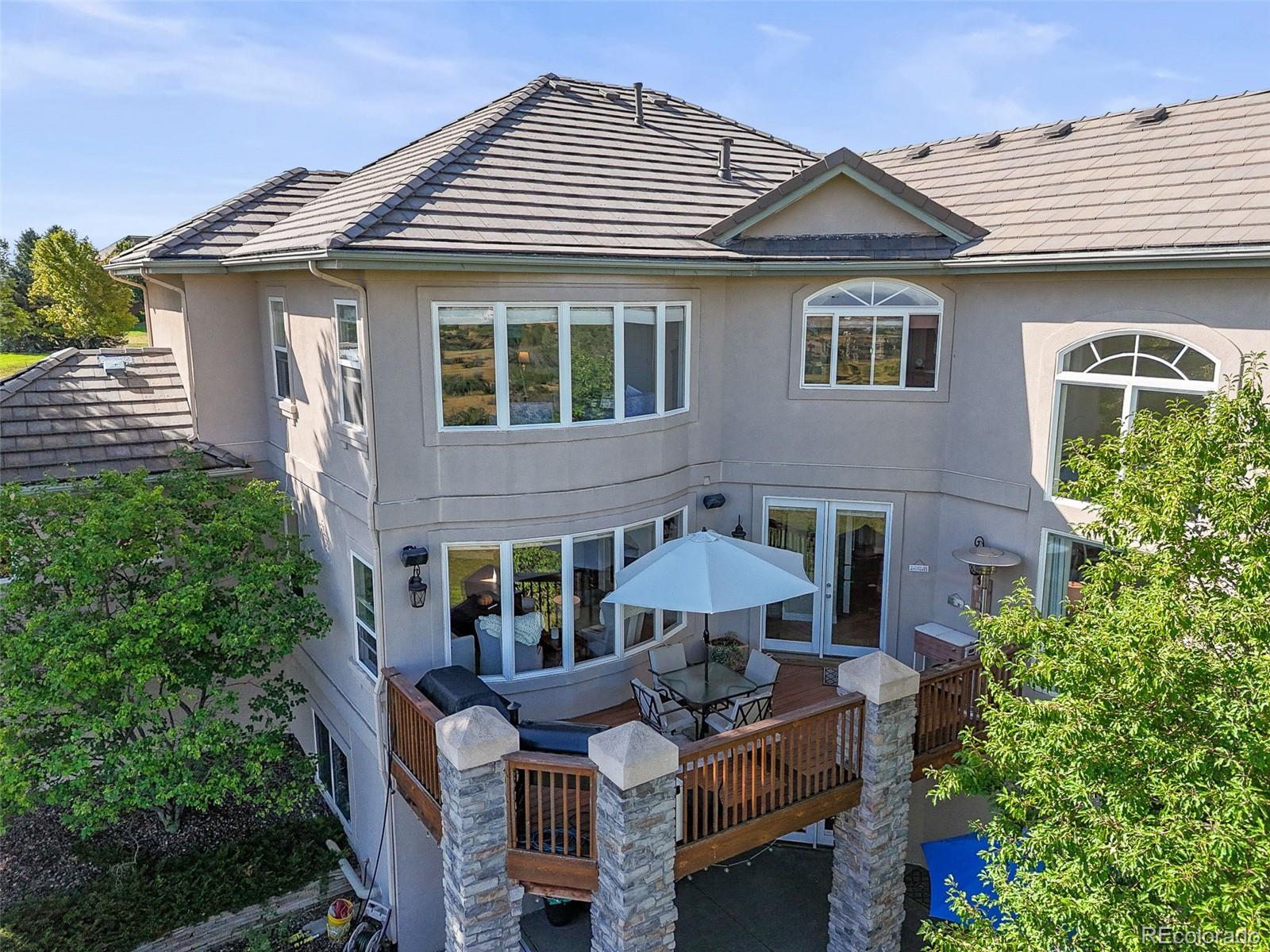 1289 Diamond Ridge Circle Castle Rock, CO 80108 - Photo 19 of 50 a front view of a house with patio