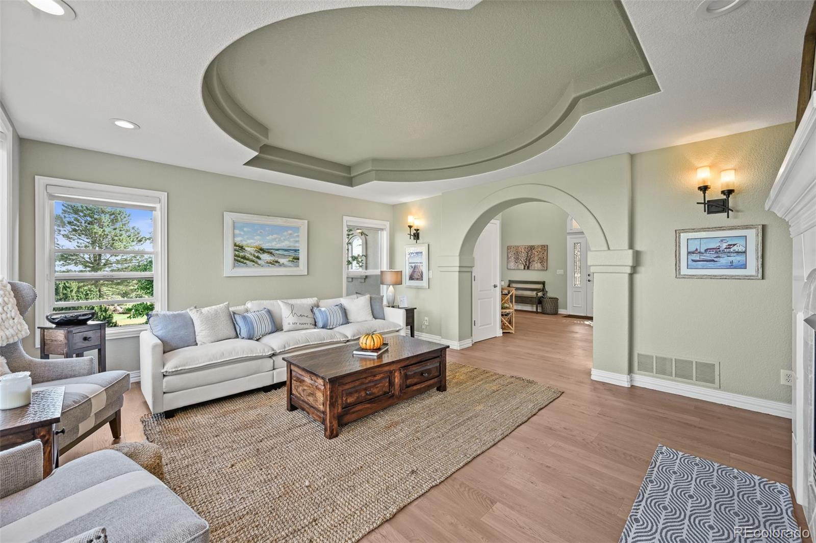 1289 Diamond Ridge Circle Castle Rock, CO 80108 - Photo 10 of 50 a living room with furniture and a window