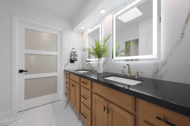 a view of a kitchen from the hallway