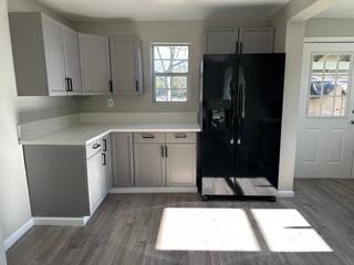 7828 Old Auburn Road Citrus Heights, CA 95610 - Photo 11 of 12 a kitchen with a sink a refrigerator and window