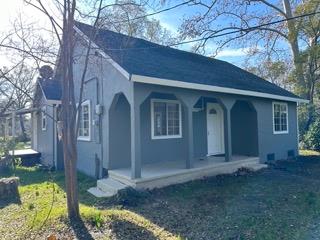 7828 Old Auburn Road Citrus Heights, CA 95610 - Photo 2 of 12 a backyard of a house with dishwasher and wooden fence