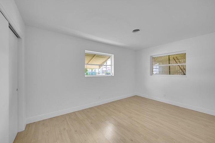 1308 South Congress Avenue Delray Beach, FL 33445 - Photo 11 of 30 a view of empty room with windows