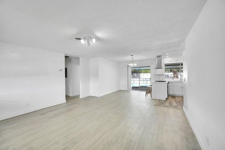 1308 South Congress Avenue Delray Beach, FL 33445 - Photo 30 of 30 a view of a kitchen with wooden floor