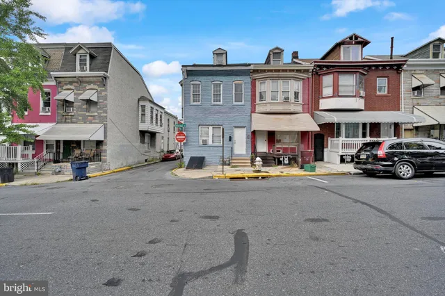 a car parked in front of a building