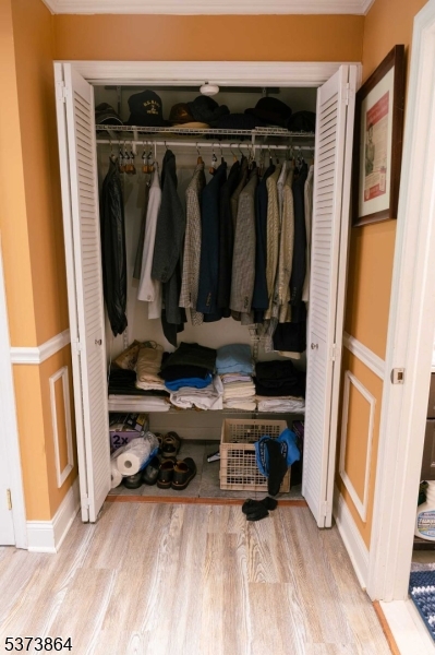 72 East Main Street High Bridge, NJ 08829 - Photo 14 of 35 a view of walk in closet with clothes and shoes