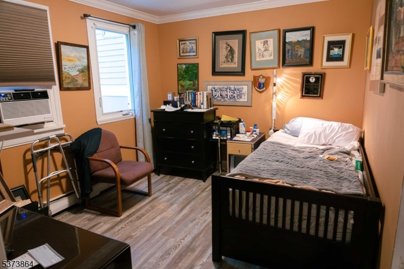 72 East Main Street High Bridge, NJ 08829 - Photo 15 of 35 a bedroom with a bed and wooden floor