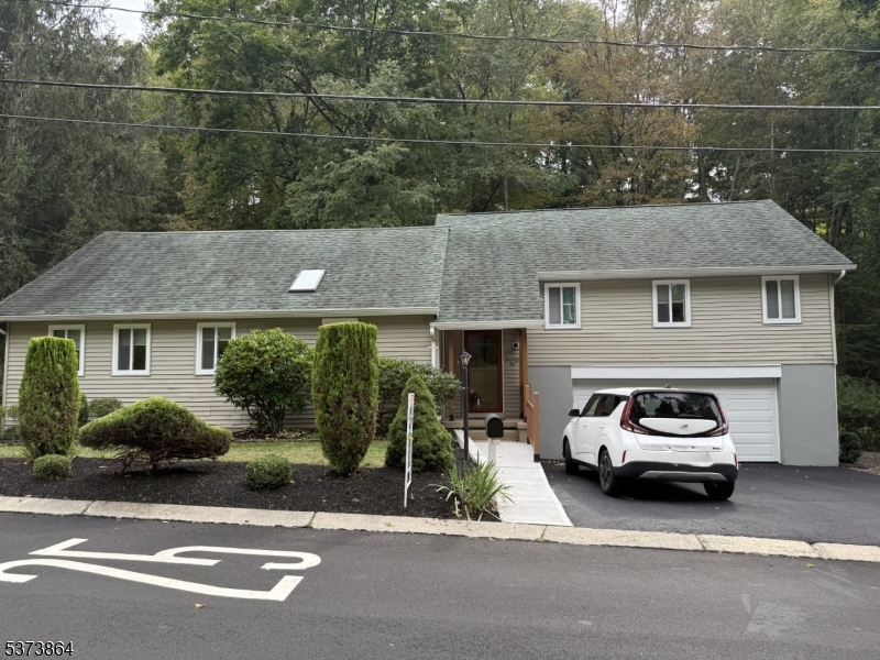72 East Main Street High Bridge, NJ 08829 - Photo 2 of 35 a car parked in front of a house