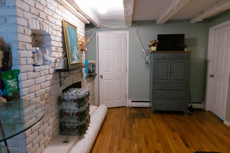 72 East Main Street High Bridge, NJ 08829 - Photo 22 of 35 a kitchen with a wooden floor and a stove top oven