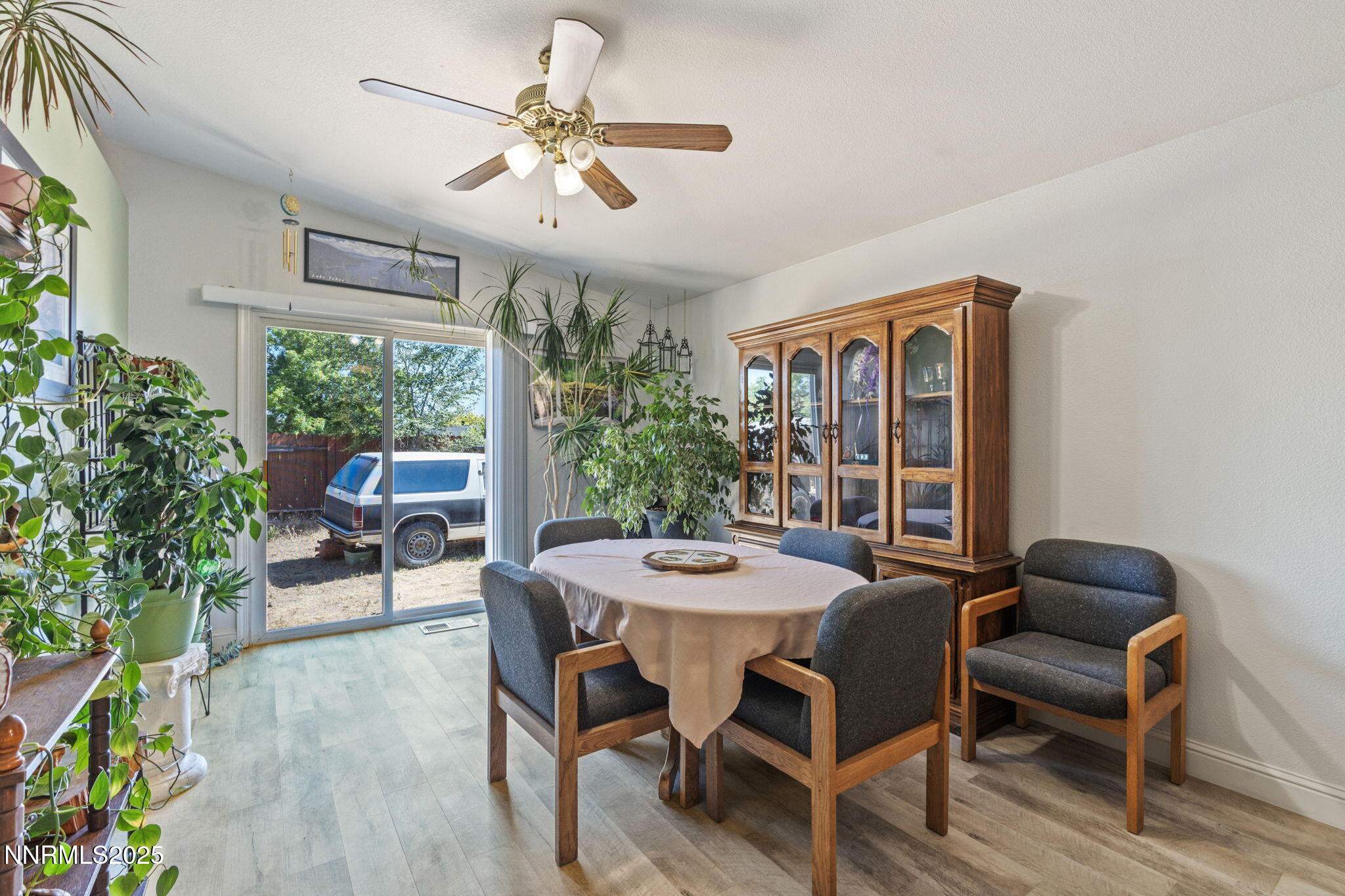 5886 Wishbone Court Sun Valley, NV 89433 - Photo 13 of 42 a view of a dining room with furniture window and outside view