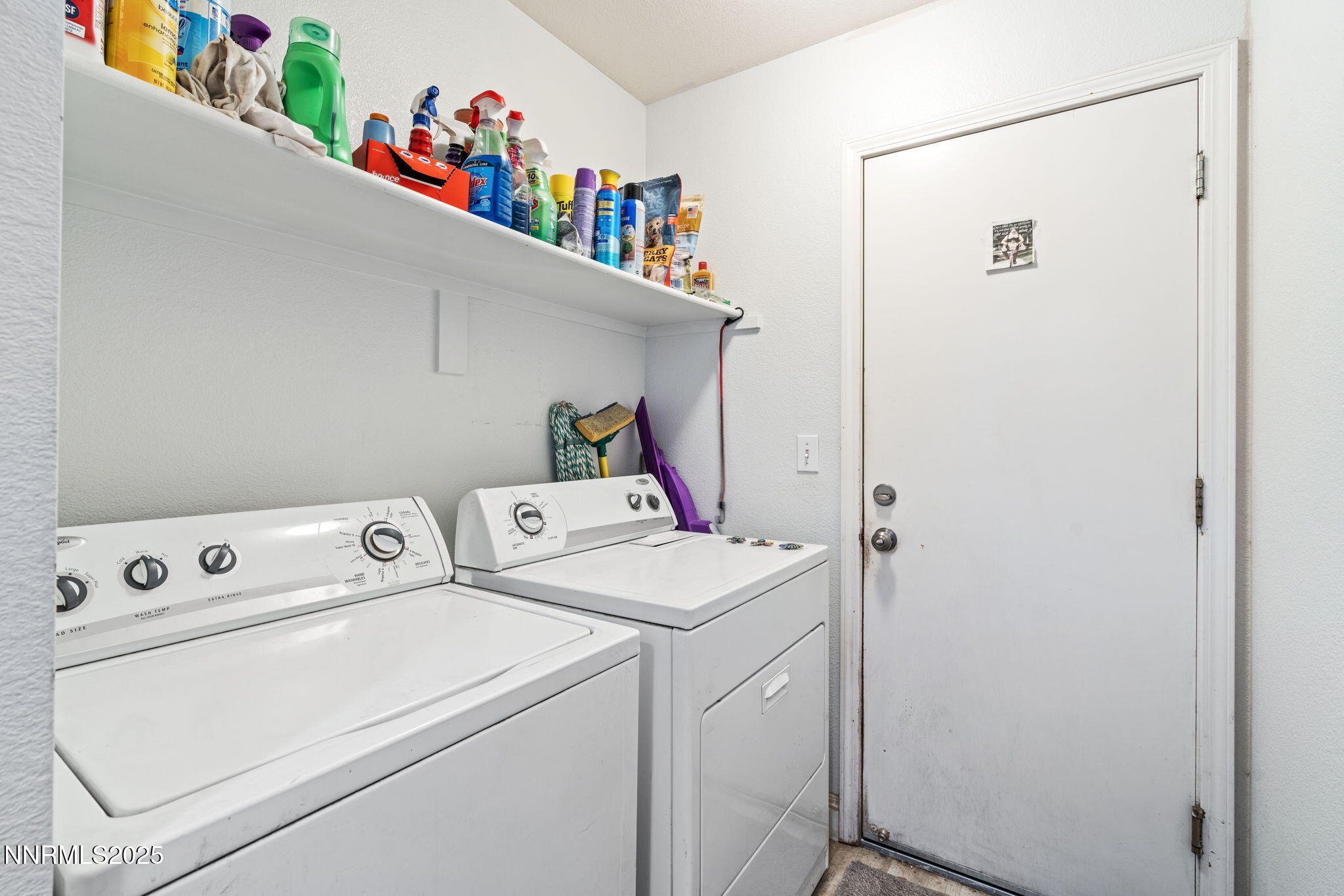 5886 Wishbone Court Sun Valley, NV 89433 - Photo 30 of 42 a utility room with dryer and washer