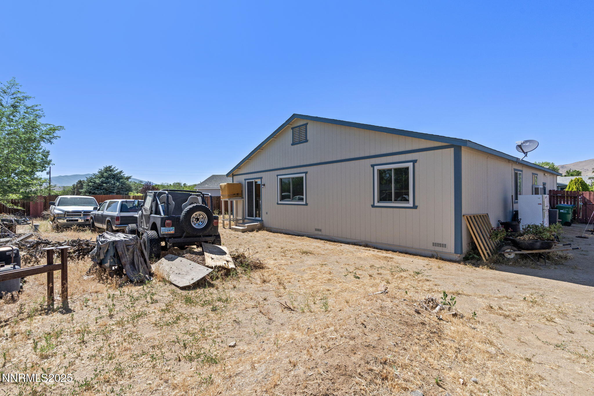 5886 Wishbone Court Sun Valley, NV 89433 - Photo 31 of 42 a view of a backyard with a patio