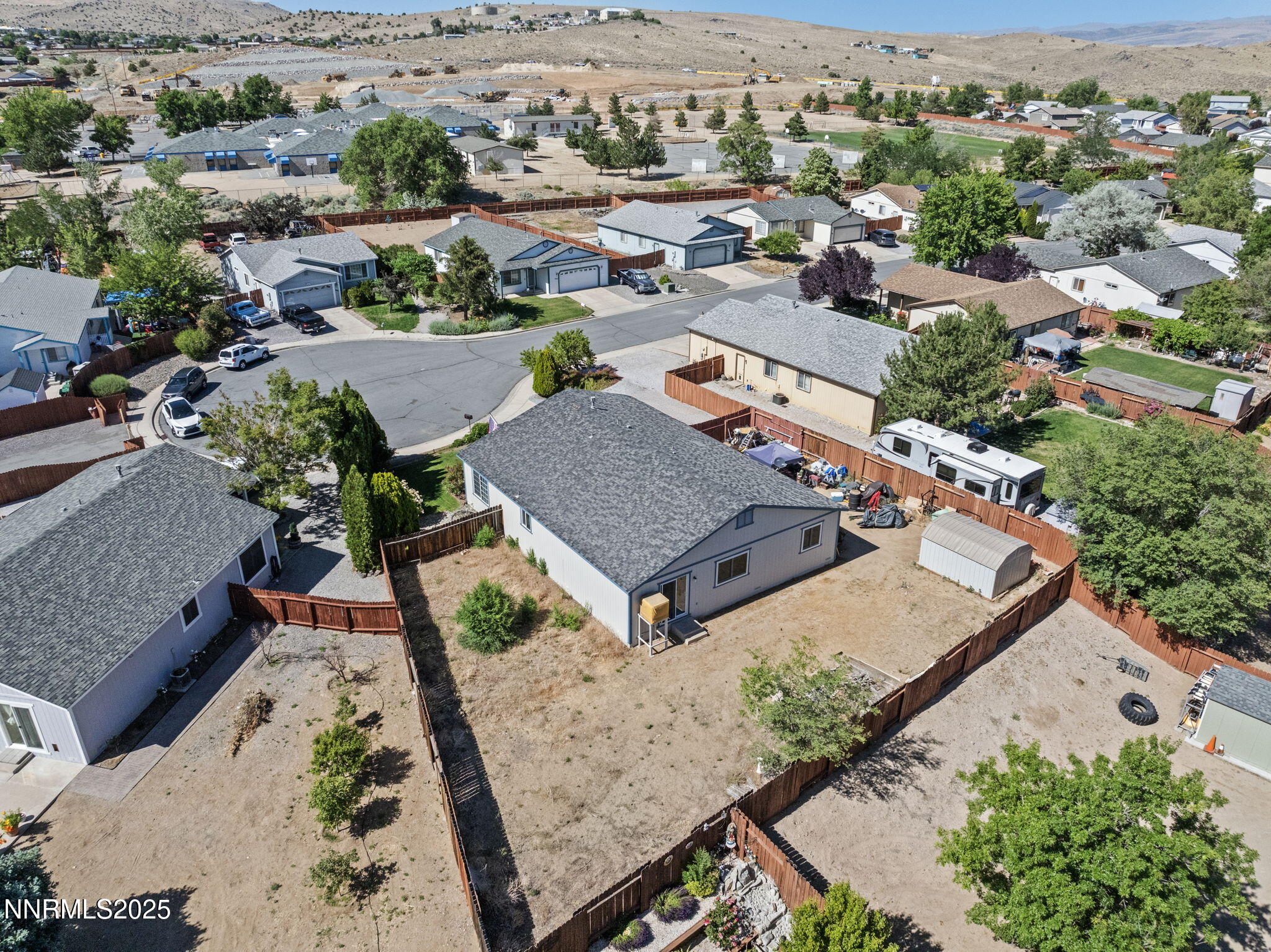 5886 Wishbone Court Sun Valley, NV 89433 - Photo 37 of 42 an aerial view of a house with a yard and lake view