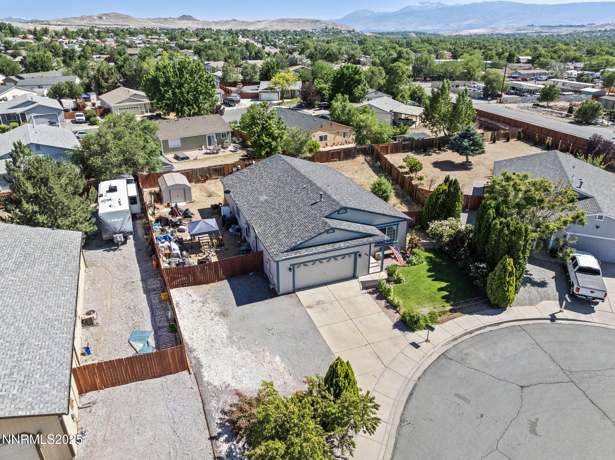 5886 Wishbone Court Sun Valley, NV 89433 - Photo 6 of 42 an aerial view of a house with yard and mountain view in back