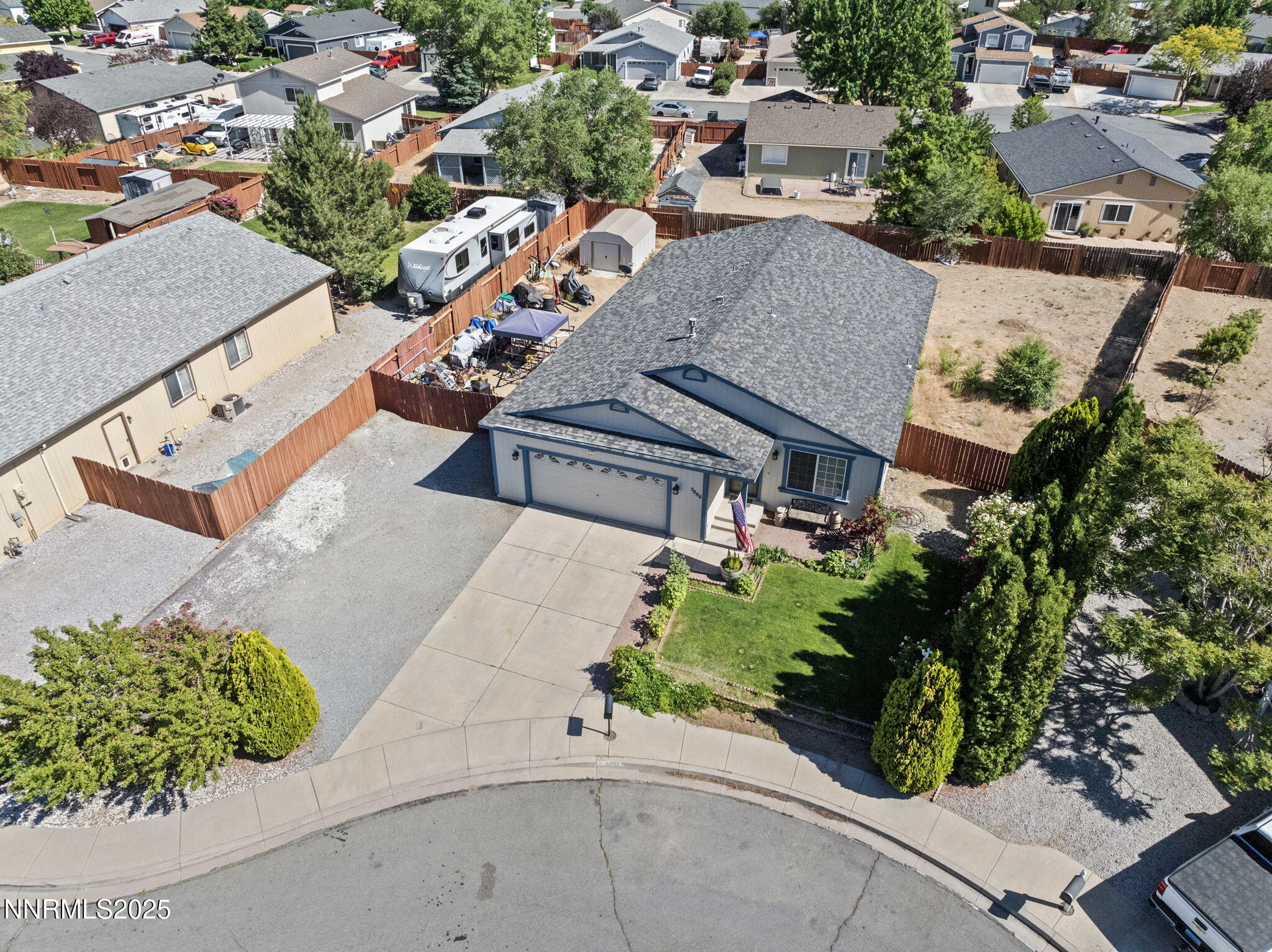 5886 Wishbone Court Sun Valley, NV 89433 - Photo 7 of 42 an aerial view of a house with a yard and garden