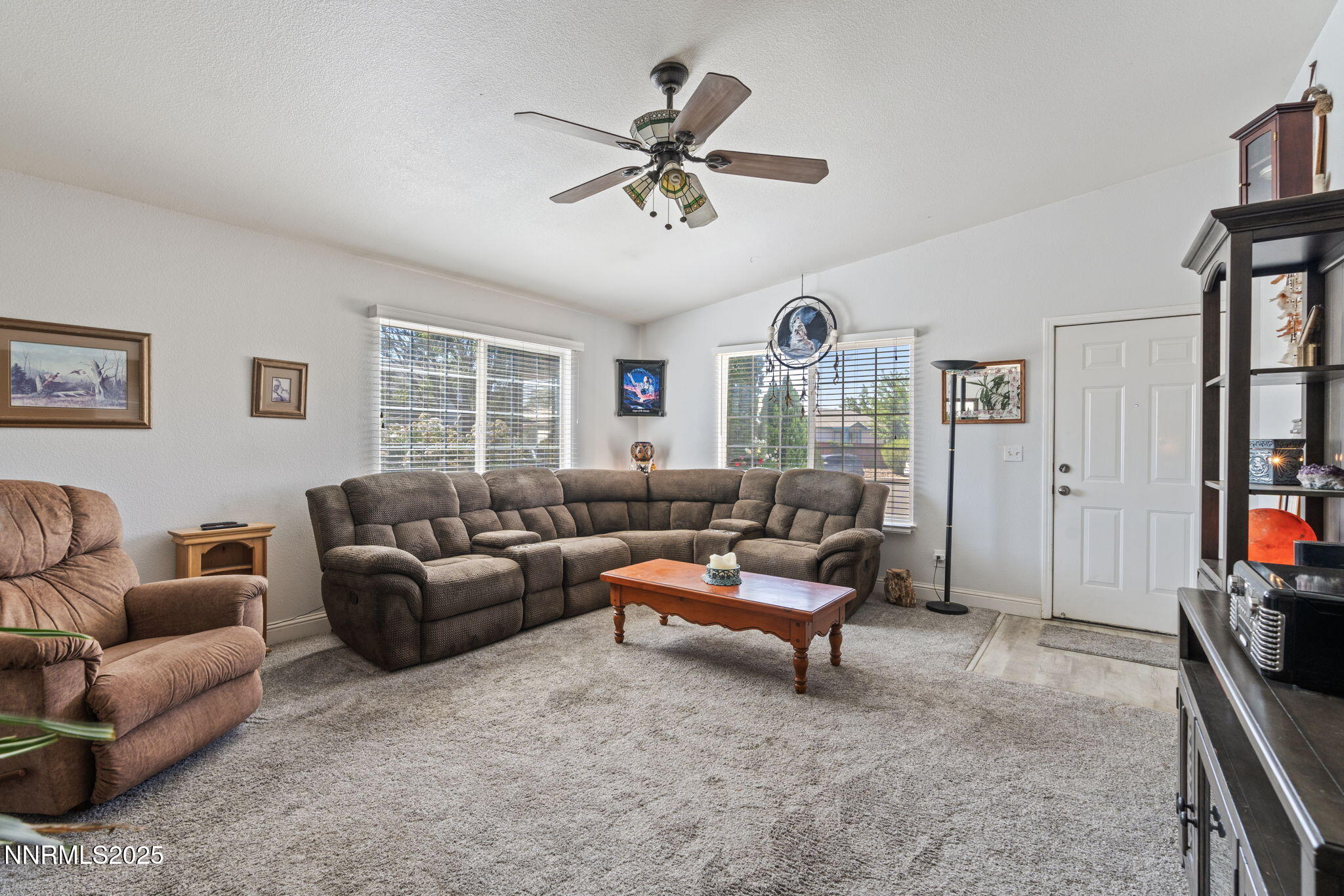 5886 Wishbone Court Sun Valley, NV 89433 - Photo 9 of 42 a living room with furniture and a window