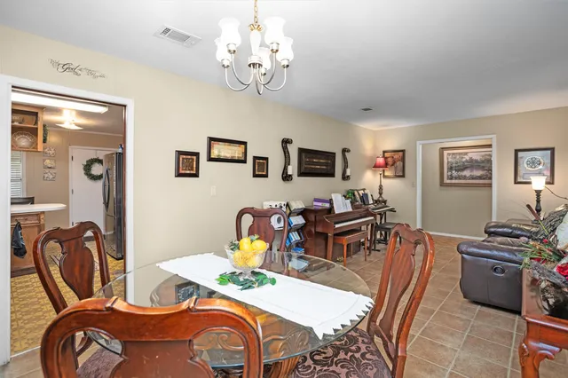 a view of a dining room with furniture