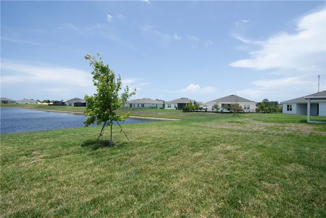 a view of a garden and basketball court