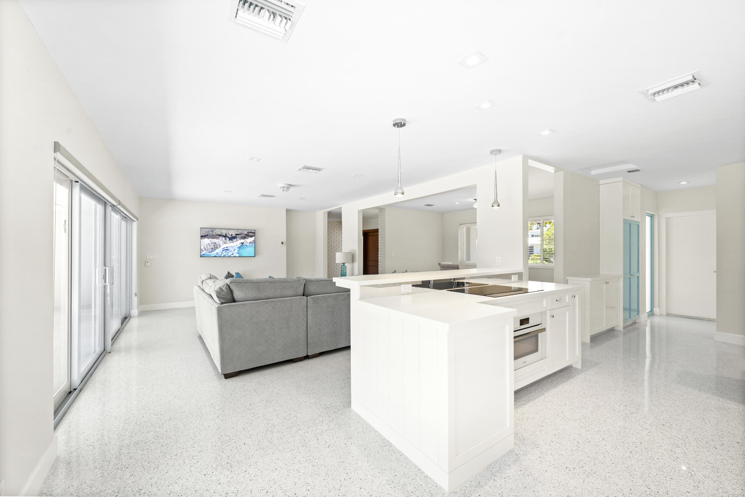 2259 Ibis Isle Road East Palm Beach, FL 33480 - Photo 11 of 35 a kitchen with a stove and a refrigerator