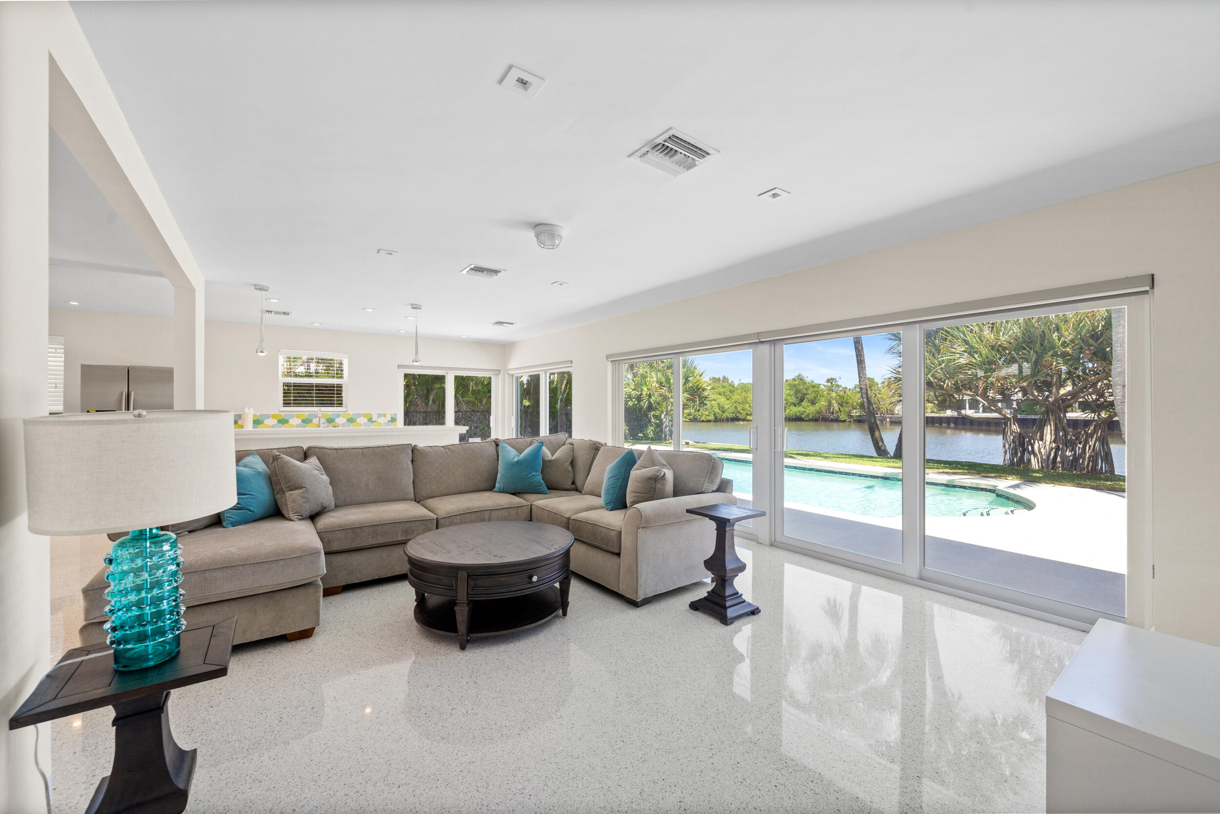 2259 Ibis Isle Road East Palm Beach, FL 33480 - Photo 14 of 35 a living room with furniture and a large window