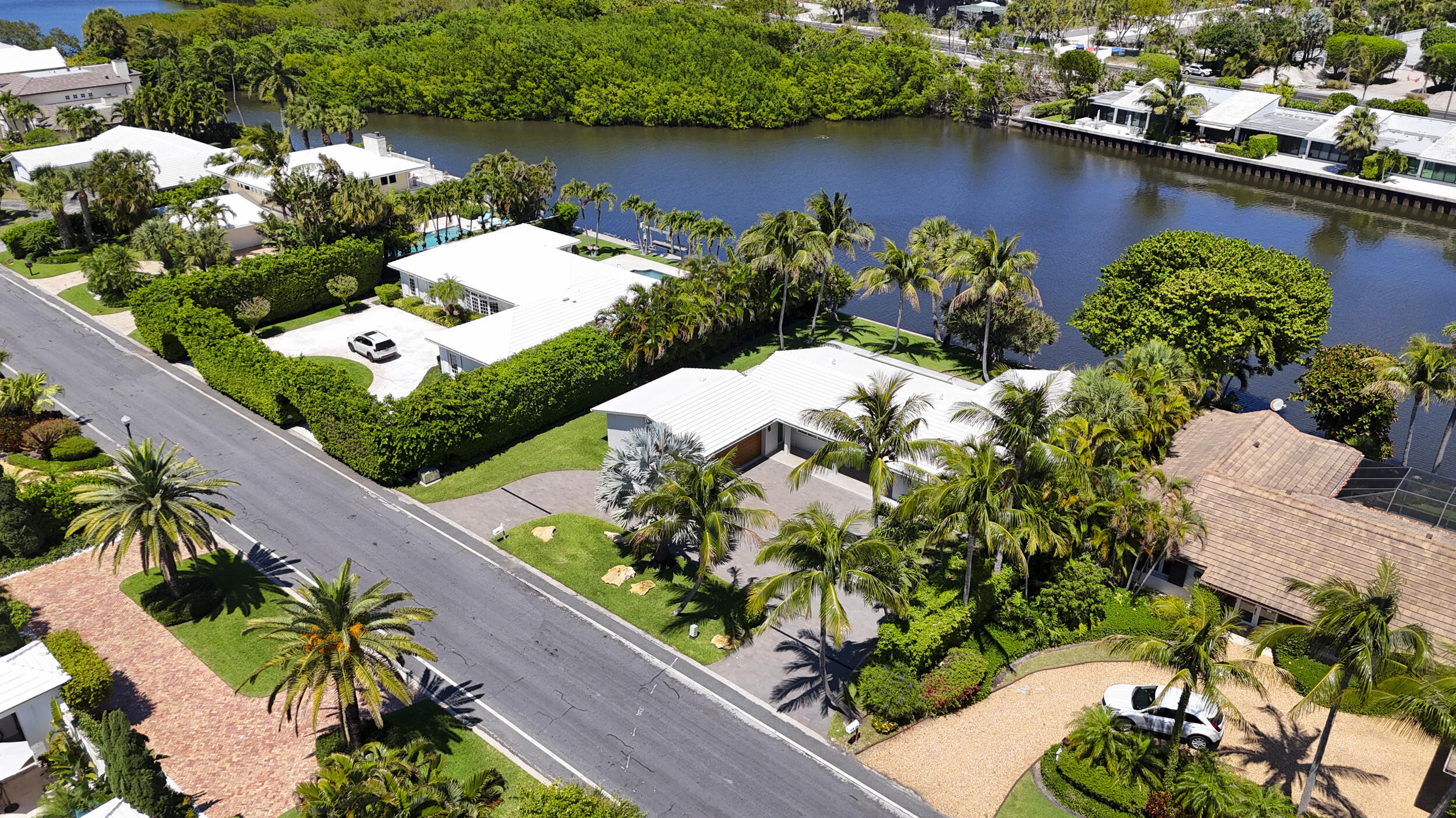 2259 Ibis Isle Road East Palm Beach, FL 33480 - Photo 26 of 35 a view of a lake with a flower park