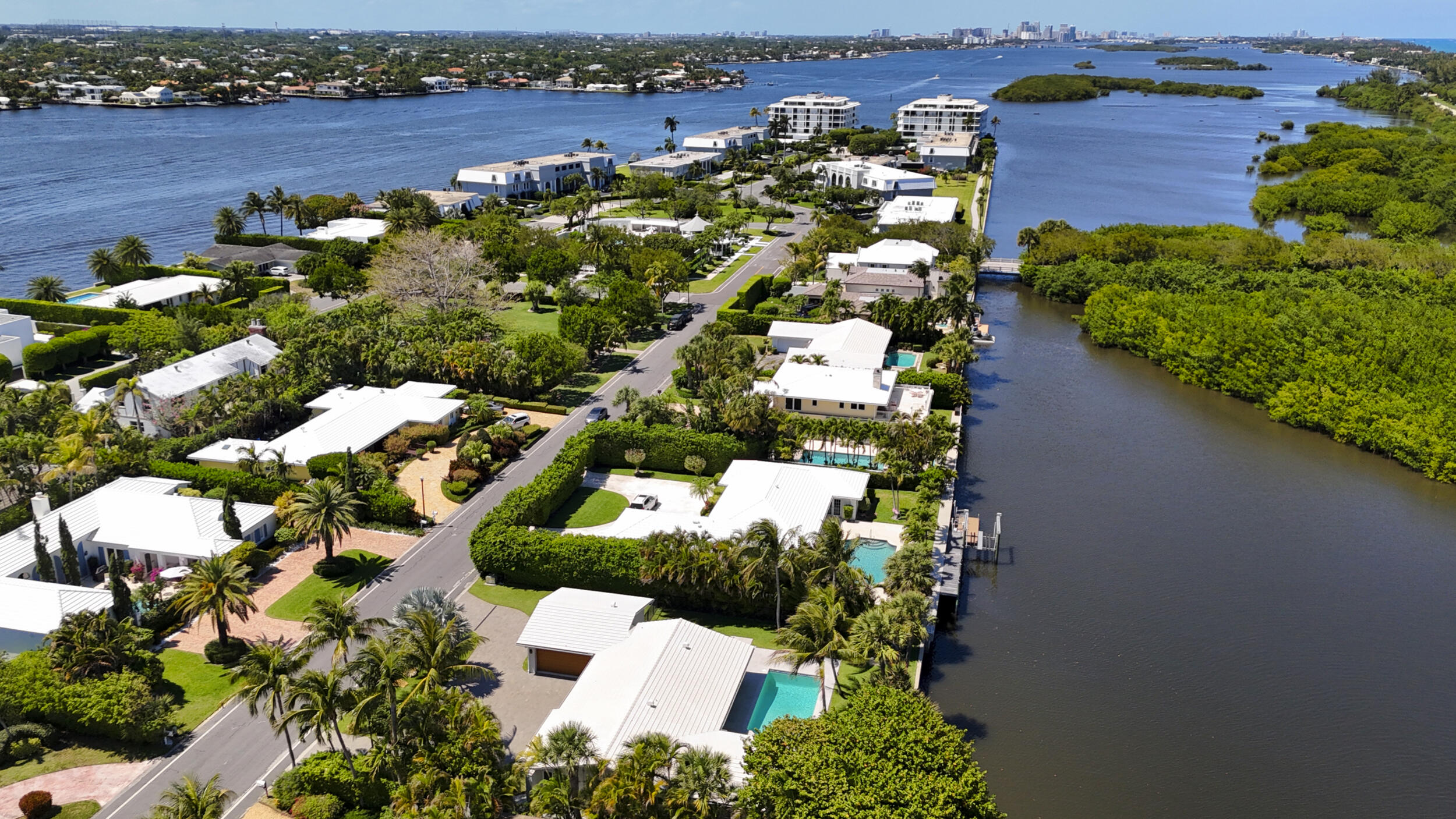 2259 Ibis Isle Road East Palm Beach, FL 33480 - Photo 30 of 35 an aerial view of a house with a yard and lake view
