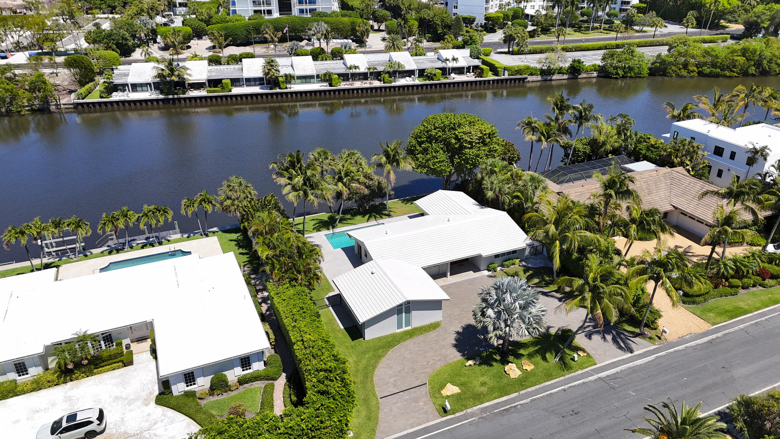2259 Ibis Isle Road East Palm Beach, FL 33480 - Photo 33 of 35 an aerial view of a house with a lake view