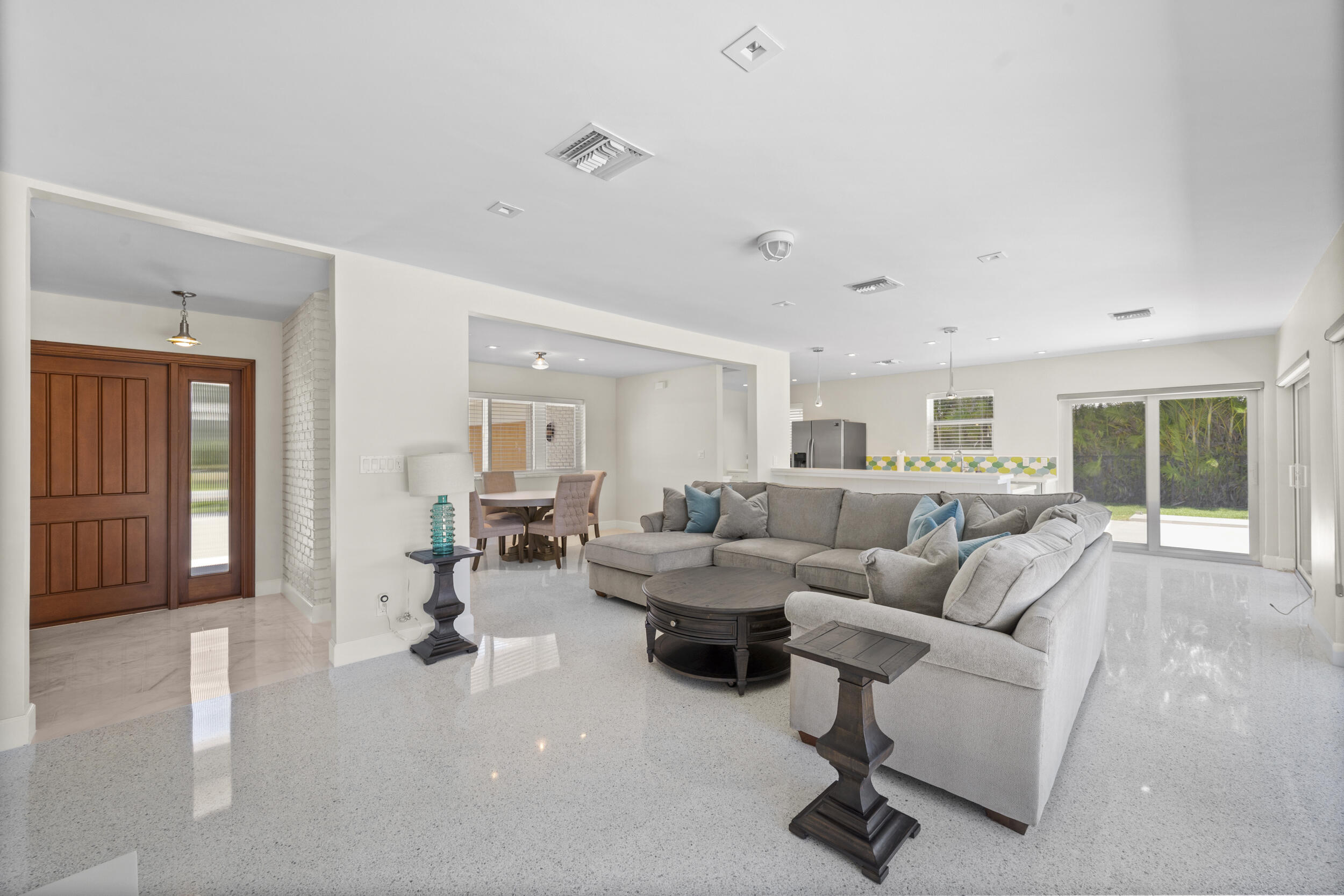 2259 Ibis Isle Road East Palm Beach, FL 33480 - Photo 5 of 35 a living room with furniture and a large window