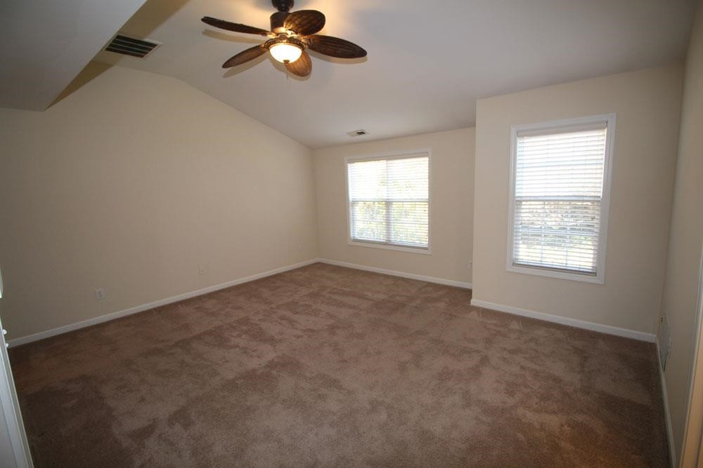 6952 Middleboro Drive Raleigh, NC 27612 - Photo 13 of 32 Spacious Master suite on 2nd floor with vaulted ceiling, ceiling fan & huge walk-in-closet. Master Bedroom
