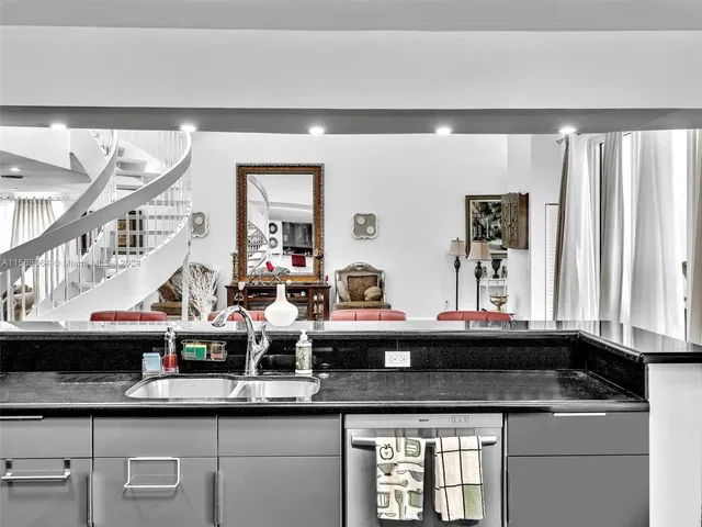 a view of a house with a small yard