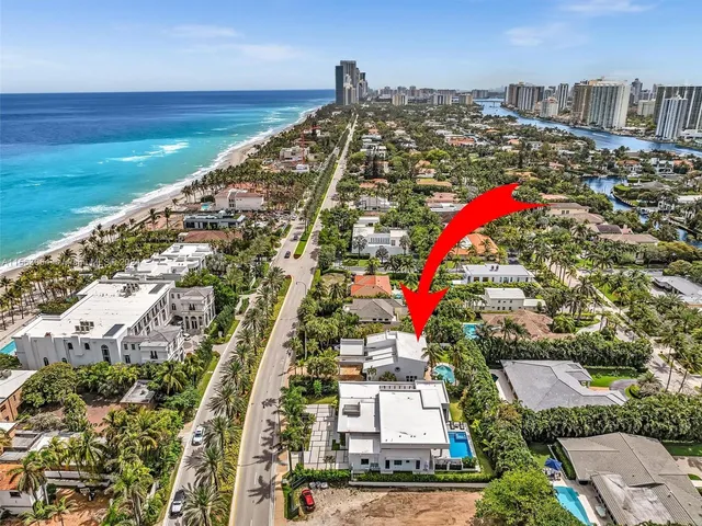 a view of entryway with livingroom and wooden floor