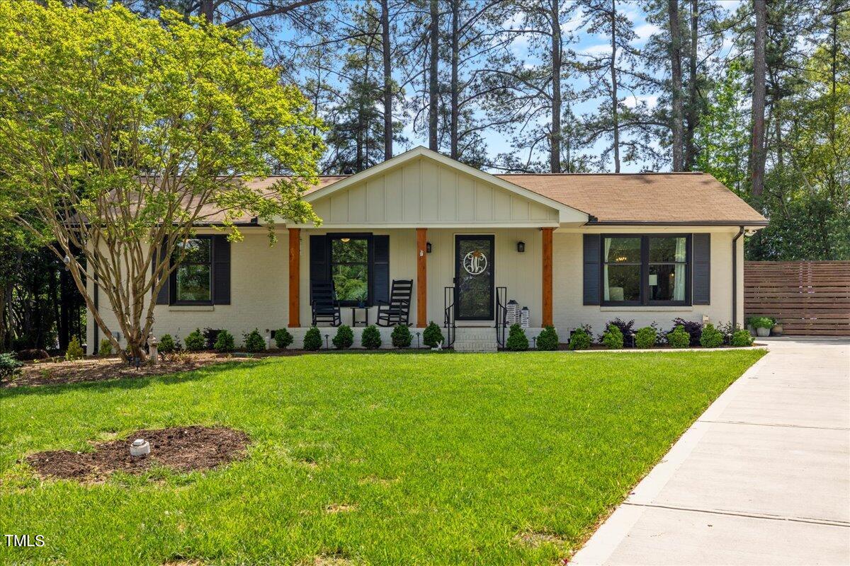 a front view of a house with yard