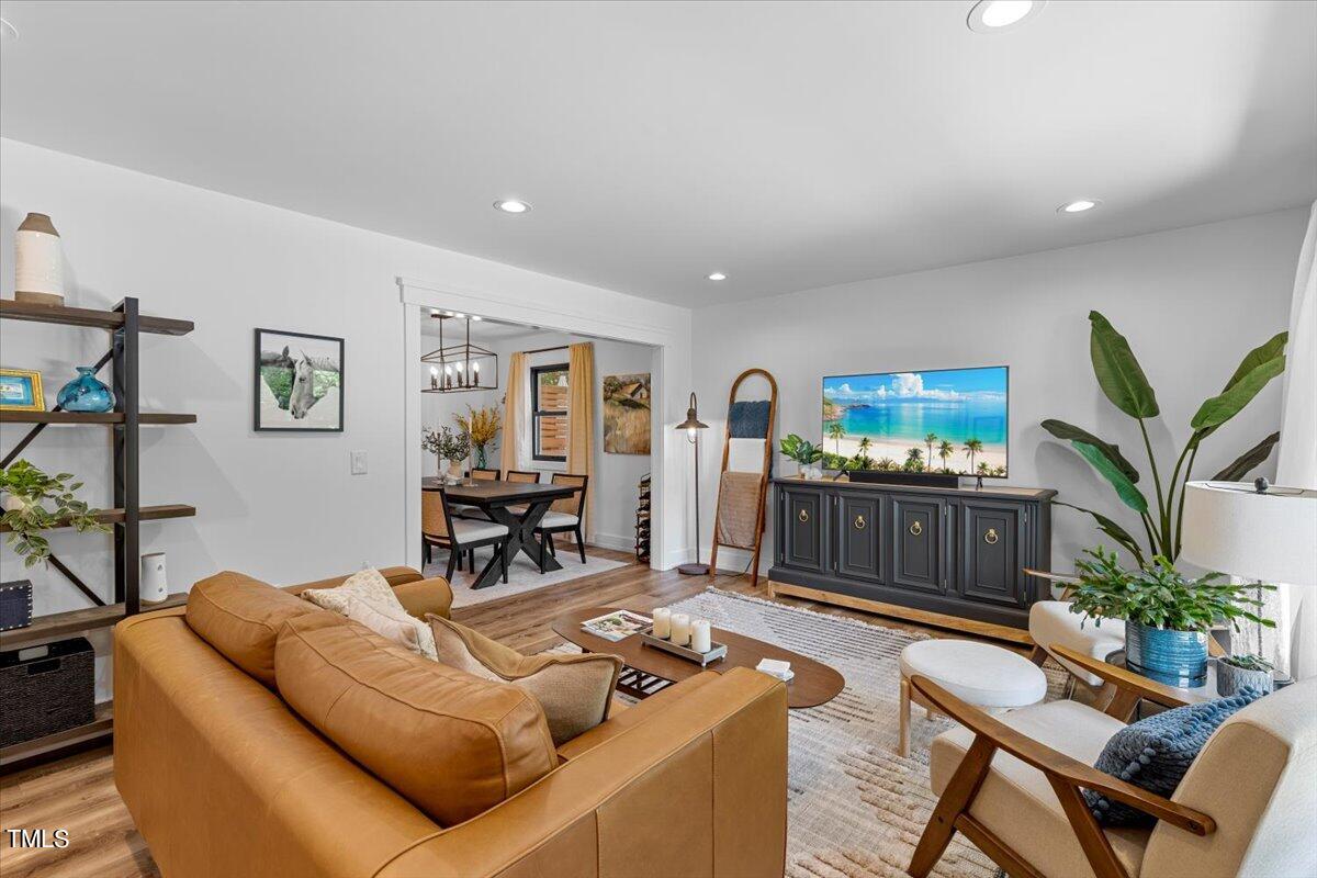 5700 Tully Court Raleigh, NC 27609 - Photo 5 of 26 a living room with furniture