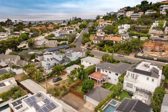 an aerial view of a city with lots of residential buildings