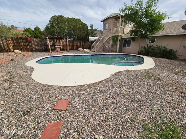 a view of outdoor space yard and swimming pool