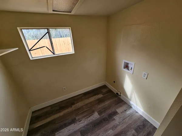 a view of an empty room and window
