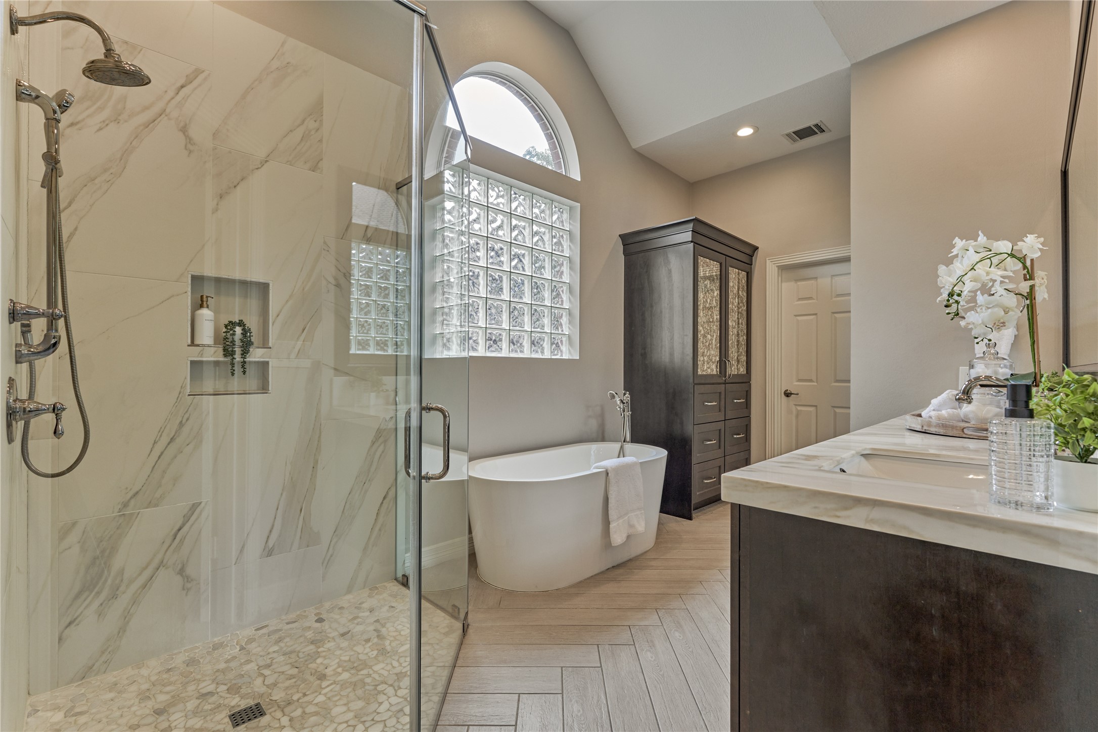7 Gentry Oak Court Spring, TX 77381 - Photo 26 of 50 a bathroom with a sink a toilet and shower