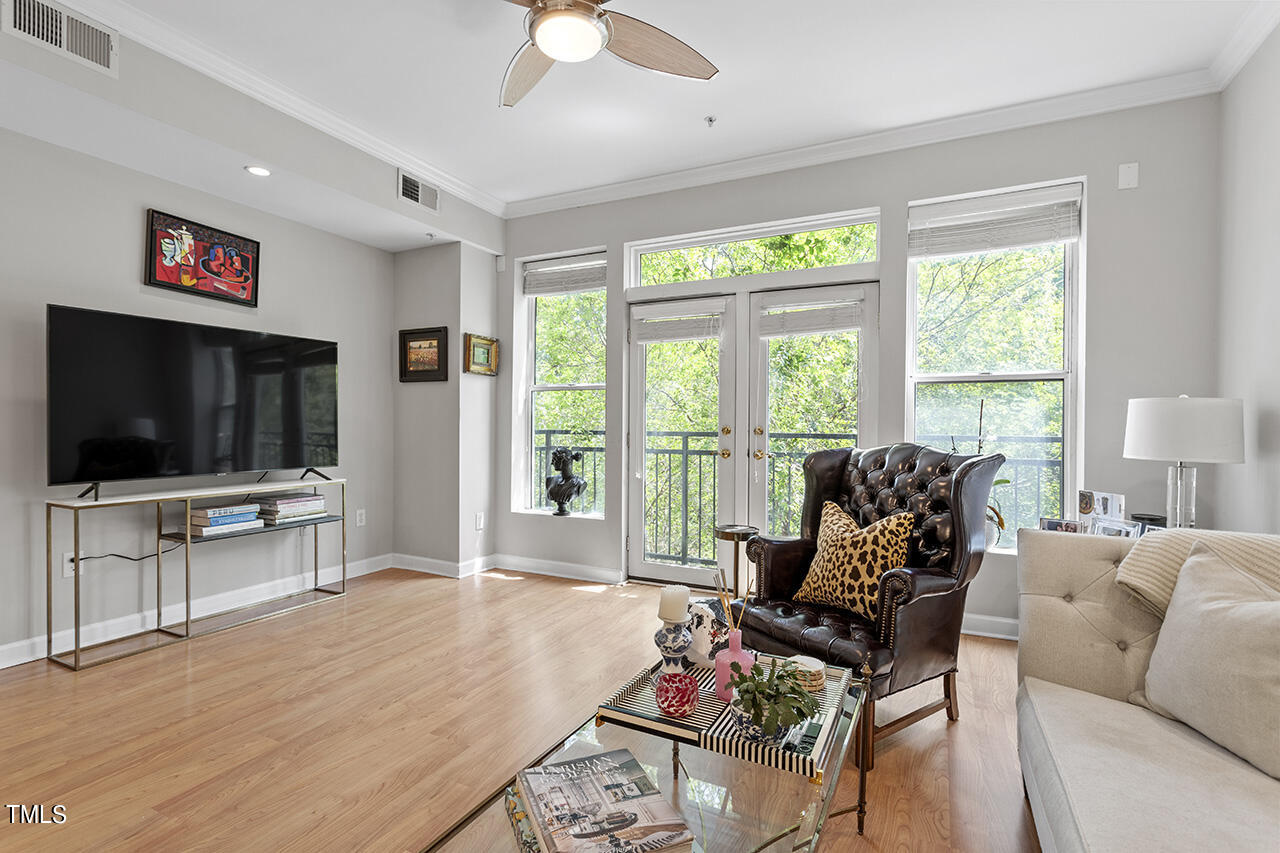 200 South Dawson Street, Unit 203 Raleigh, NC 27601 - Photo 13 of 35 Living Room with Juliet Balcony overlooking Nash Square