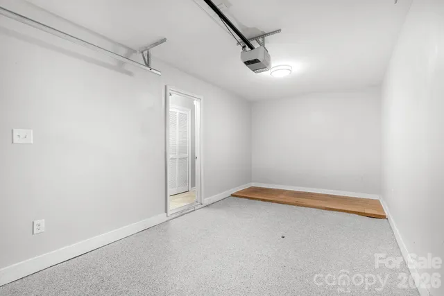 an empty room with shelves