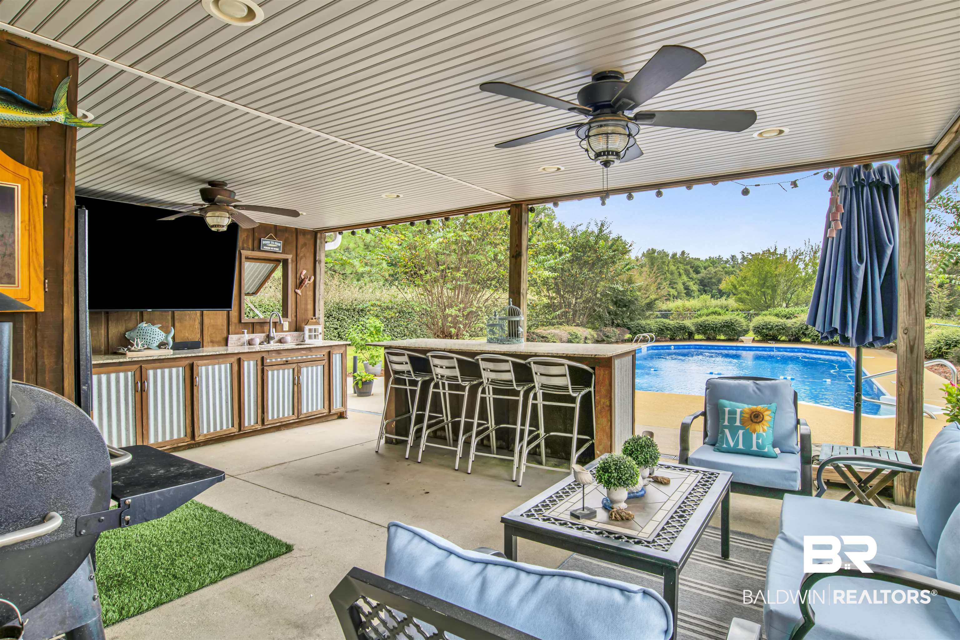 13385 Tom Gaston Road Mobile, AL 36695 - Photo 4 of 42 View of patio / terrace with outdoor lounge area, ceiling fan, and exterior bar