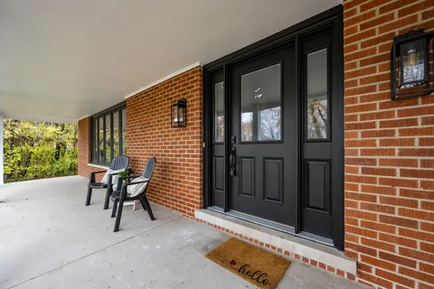 a living room with furniture and a couch