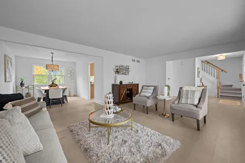 a kitchen with stainless steel appliances a sink stove and cabinets