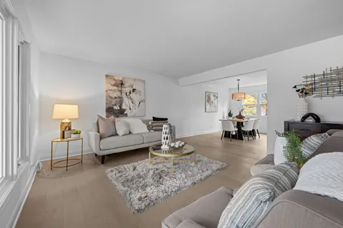 a kitchen with stainless steel appliances granite countertop a stove top oven a sink a counter top space and cabinets