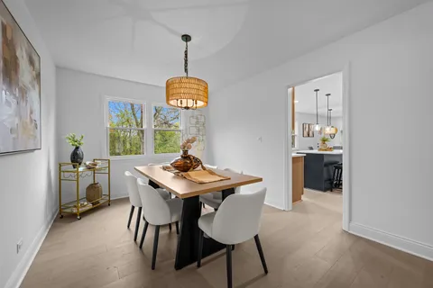 a spacious bathroom with sink and mirror