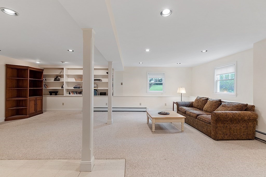 147 Silver Hill Road Concord, MA 01742 - Photo 21 of 28 a living room with furniture and windows