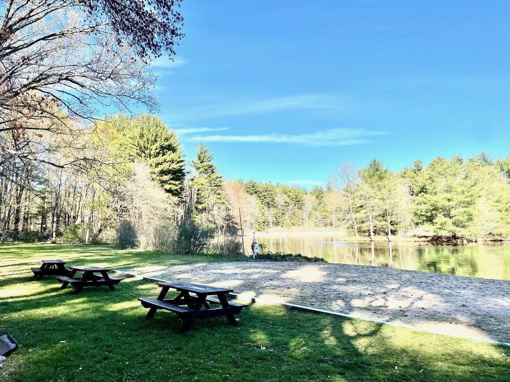 147 Silver Hill Road Concord, MA 01742 - Photo 27 of 28 a view of swimming pool with lawn chairs and iron fence