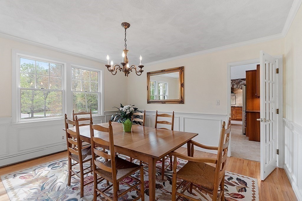 147 Silver Hill Road Concord, MA 01742 - Photo 4 of 28 a view of a dining room with furniture window and wooden floor
