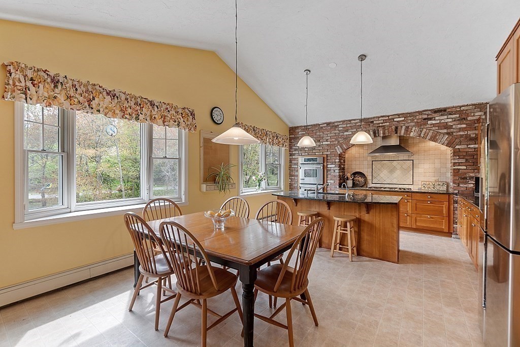 147 Silver Hill Road Concord, MA 01742 - Photo 5 of 28 a view of a dining room with furniture window and outside view