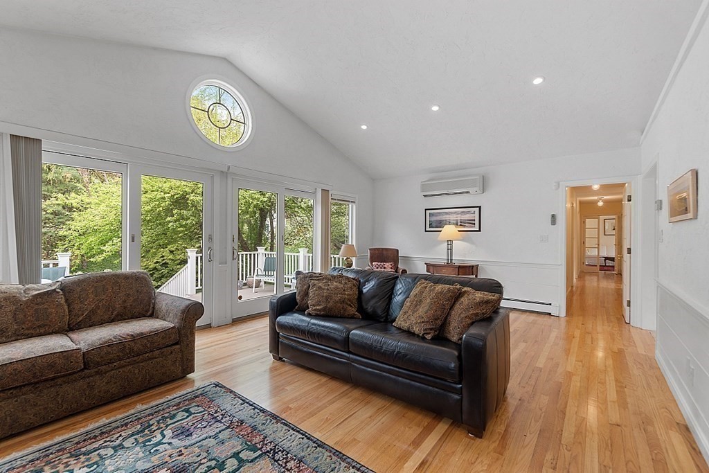147 Silver Hill Road Concord, MA 01742 - Photo 9 of 28 a living room with furniture and a large window