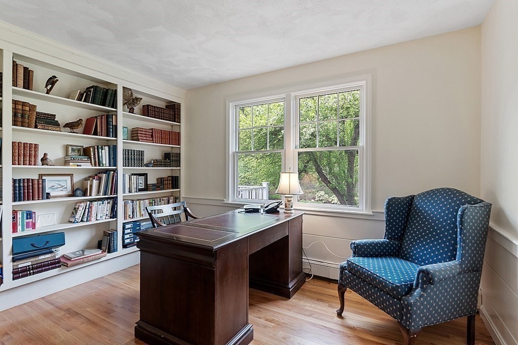 147 Silver Hill Road Concord, MA 01742 - Photo 10 of 28 a view of a workspace with furniture and a window